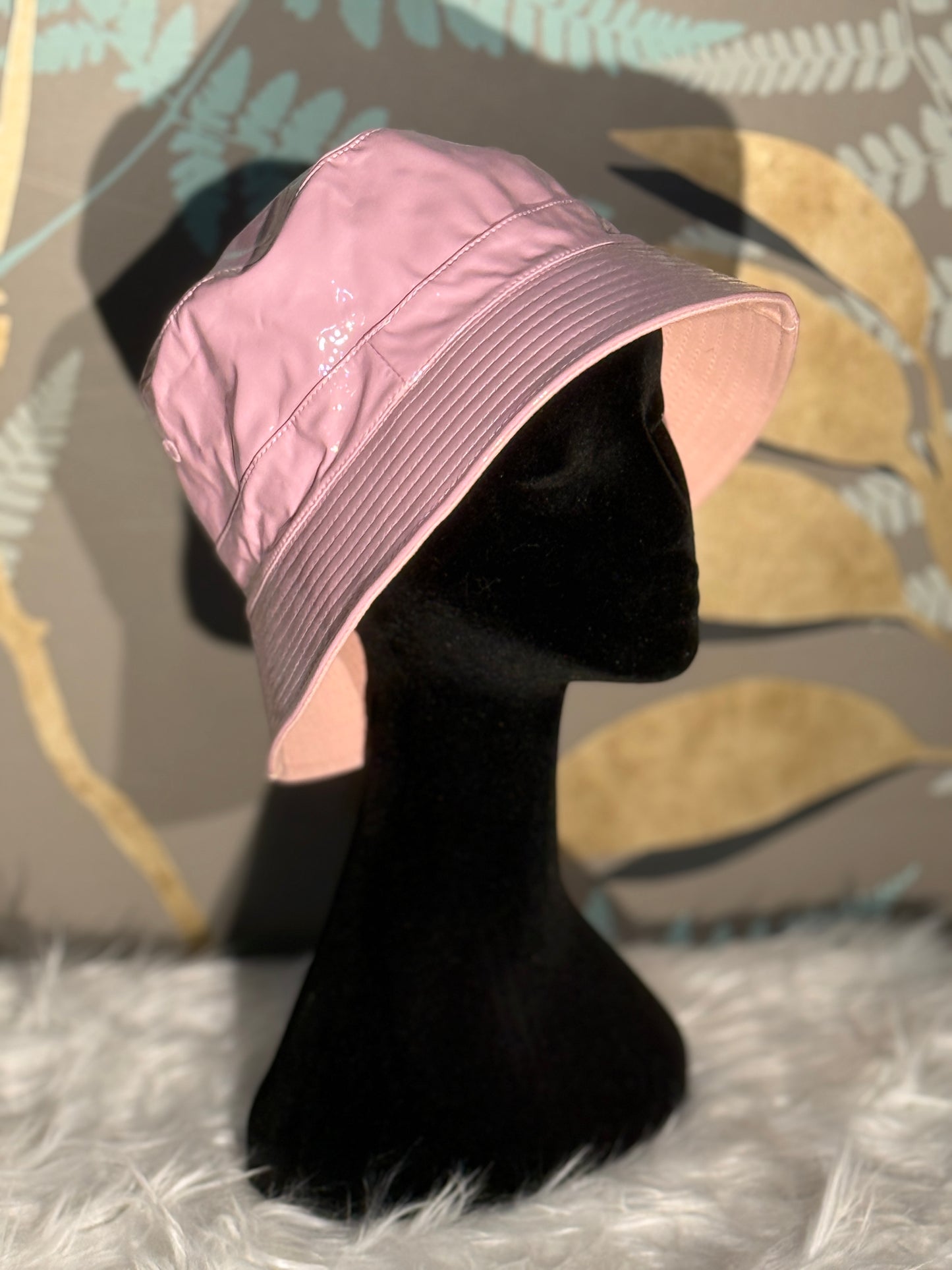 Cappello da pioggia rosa